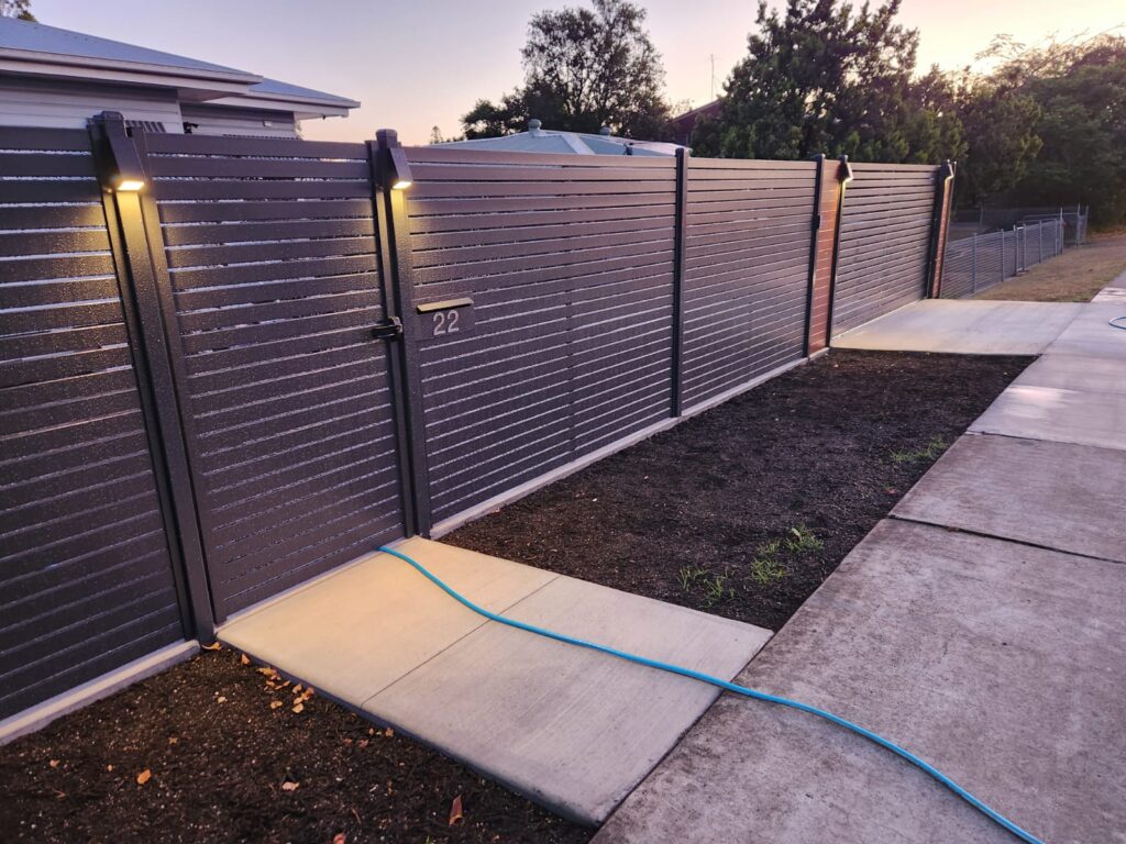 New lighting along a fence provides security