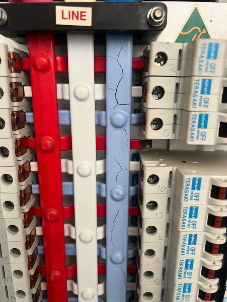 Cracked busbar discovered during a switchboard inspection at a Chermside motel